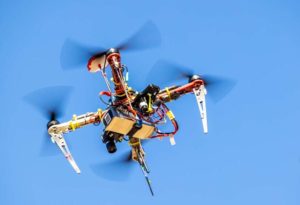 A photo of a drone flying in the sky.