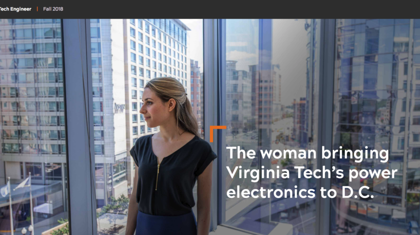 Screenshot of photo of a woman stands in front of a window. Behind her stand tall buildings with large glass windows in a modern cityscape. The words "The woman bringing Virginia Tech's power electronics to D.C." are written over the image.